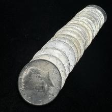 Roll of 20 uncirculated 1964 Kennedy half dollars