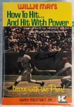 WILLIE MAYS SIGNED COVER OF "HOW TO HIT...AND WITH POWER" W/ COA
