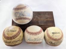 4 BASEBALLS (2 MAJOR LEAGUE) UNKNOWN SIGNATURE ON 1 & WHAT IS BELIEVED TO BE A REPRINT MICKEY MANTLE