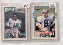 1987 TOPPS #296 RANDALL CUNNINGHAM ROOKIE CARD & 1989 TOPPS TRADED 70T TROY AIKMAN ROOKIE CARD