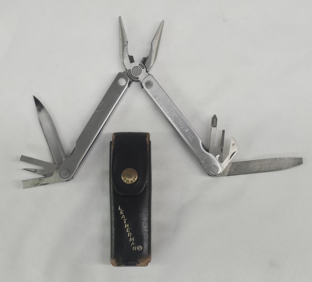 LEATHERMAN MULTITOOL AND VINTAGE LEATHER CARRYING CASE