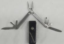 lEATHERMAN MULTITOOL AND VINTAGE SHEATH
