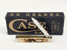 NIB CASE XX AMBER BONE PEACH SEED BABY DOC KNIFE