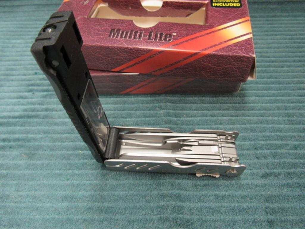2 Gerber multi- lites, new old stock, in packages, both for one money