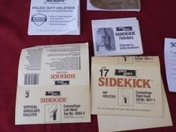 Lot of misc gun related items. trigger lock. trap gun forend. flashlight.