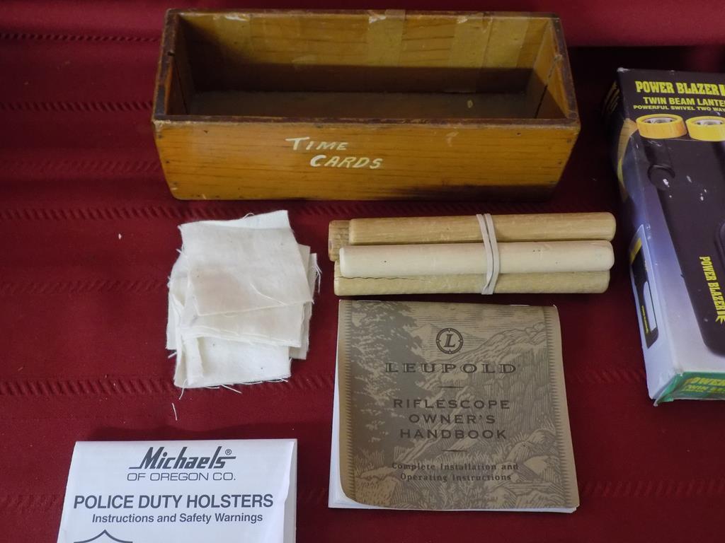 Lot of misc gun related items. trigger lock. trap gun forend. flashlight.