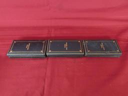3 Bronze star medals in cases.