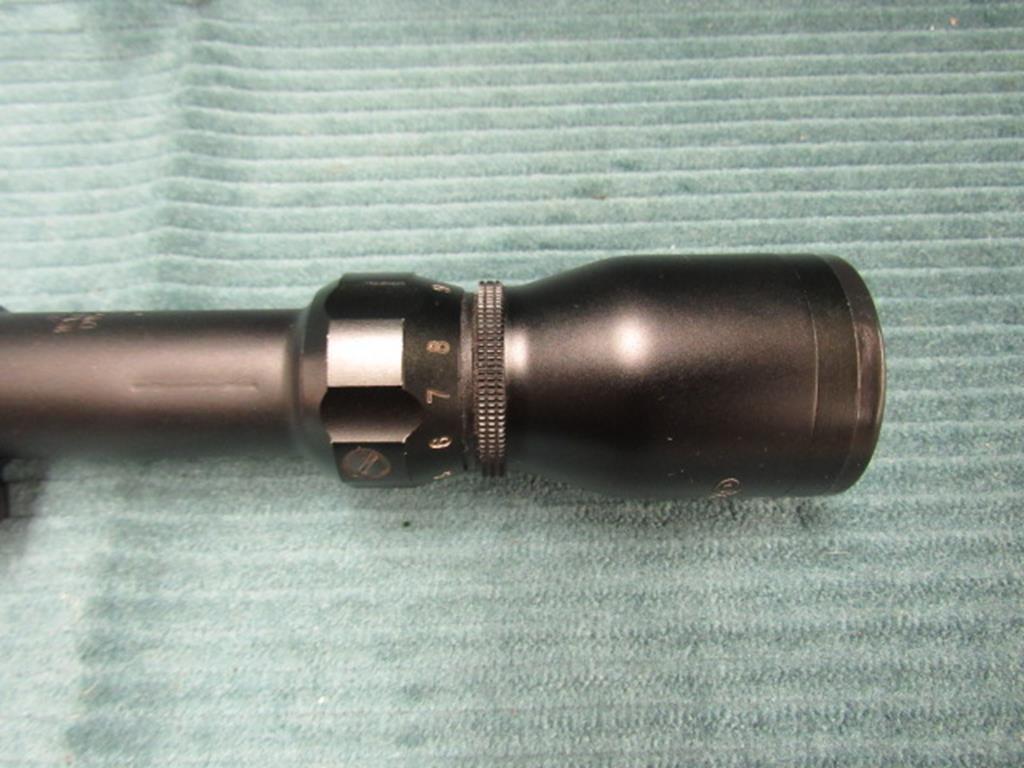 1- Tasco 3x-8x-40 World Class Scope, scope has been previously
