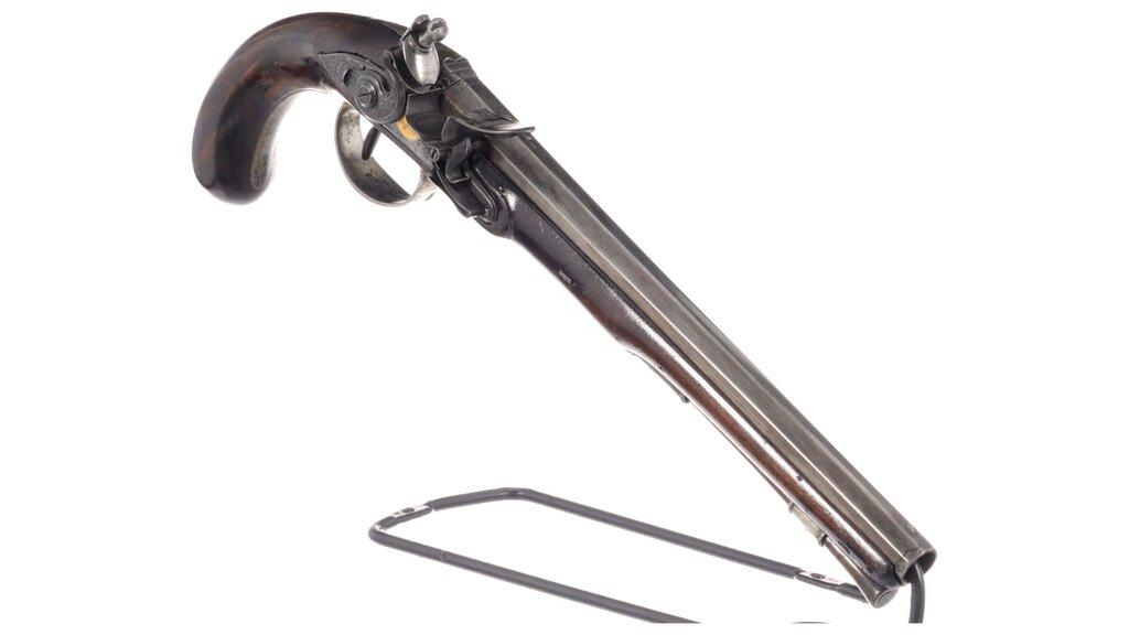 Cased Pair of Engraved Wogdon Marked Flintlock Pistols