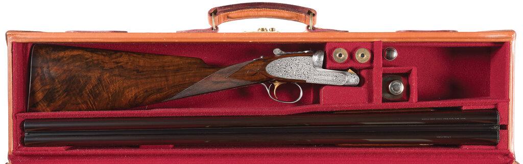 Pair of S. J. Kelly Engraved James Purdey & Sons Shotguns