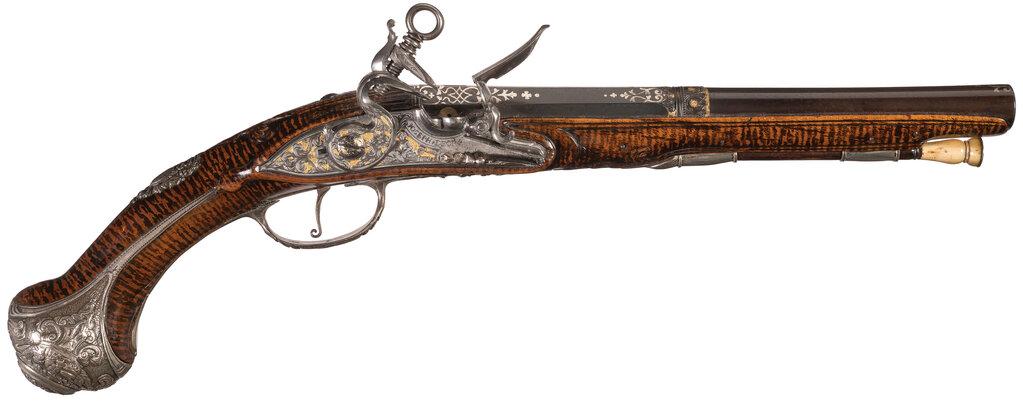 Pair of Ornate Silver Mounted Madrid-Lock Pistols