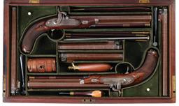 Cased Pair of Percussion Pistols with Additional Barrels