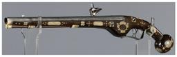 Ornate Wheellock Pistol with Engraved Stock Inlays