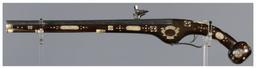 Ornate Wheellock Pistol with Engraved Stock Inlays
