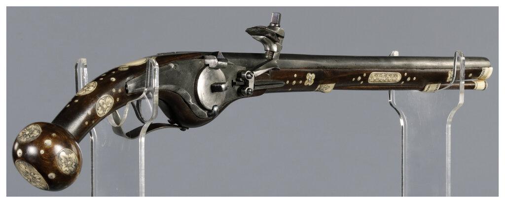 Ornate Wheellock Pistol with Engraved Stock Inlays