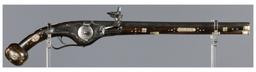 Ornate Wheellock Pistol with Engraved Stock Inlays