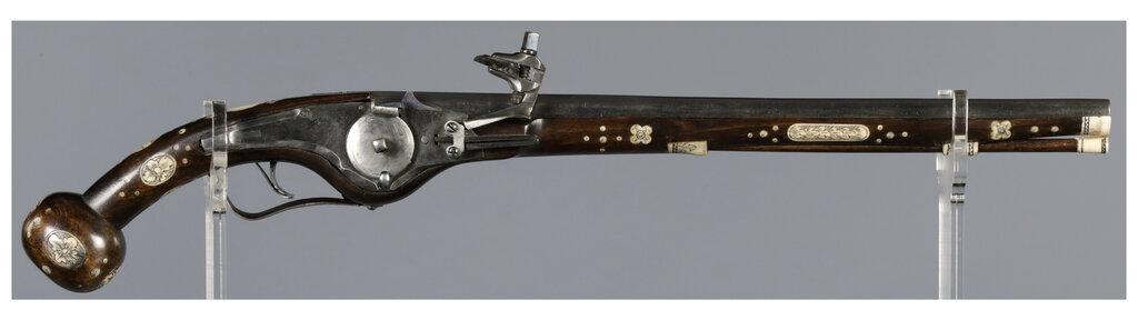 Ornate Wheellock Pistol with Engraved Stock Inlays