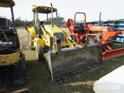 NEW HOLLAND LB75 BACKHOE 2WD OPEN-STATION W/ BUCKET & FORKS SN#031032951 (ODOMETER SHOWS: 4,600 HRS.