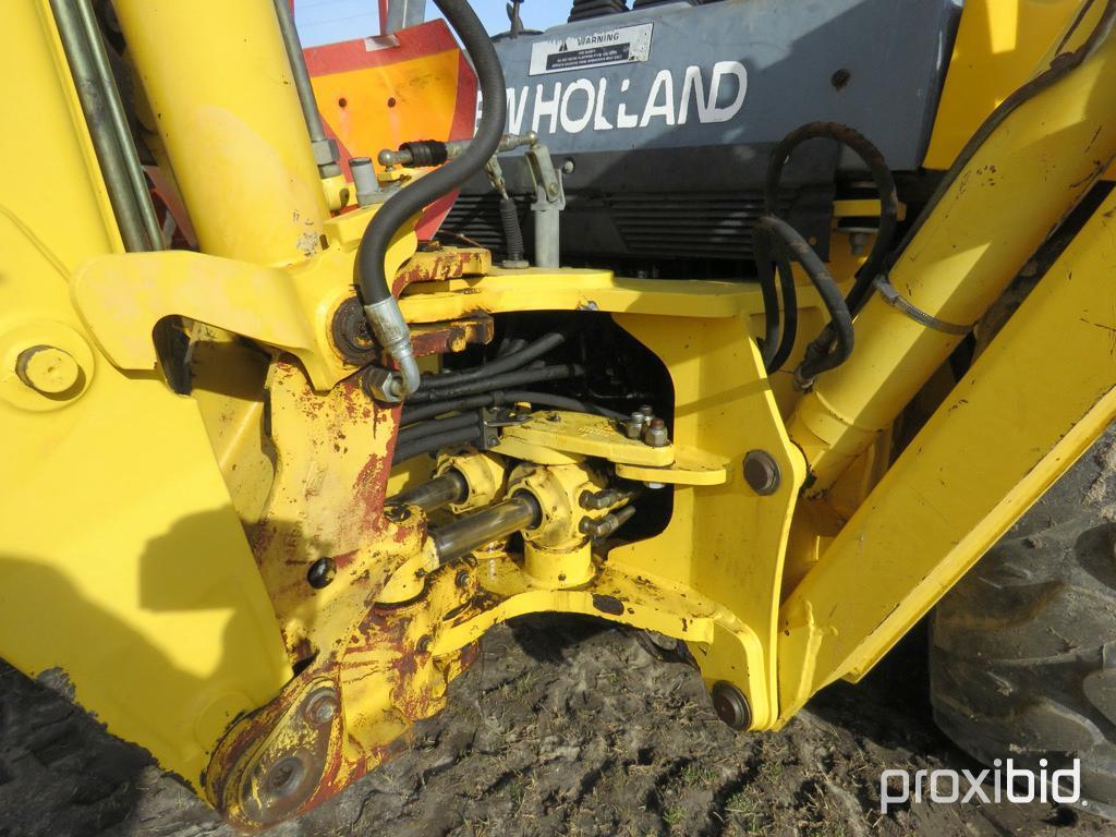 NEW HOLLAND LB75 BACKHOE 2WD OPEN-STATION W/ BUCKET & FORKS SN#031032951 (ODOMETER SHOWS: 4,600 HRS.
