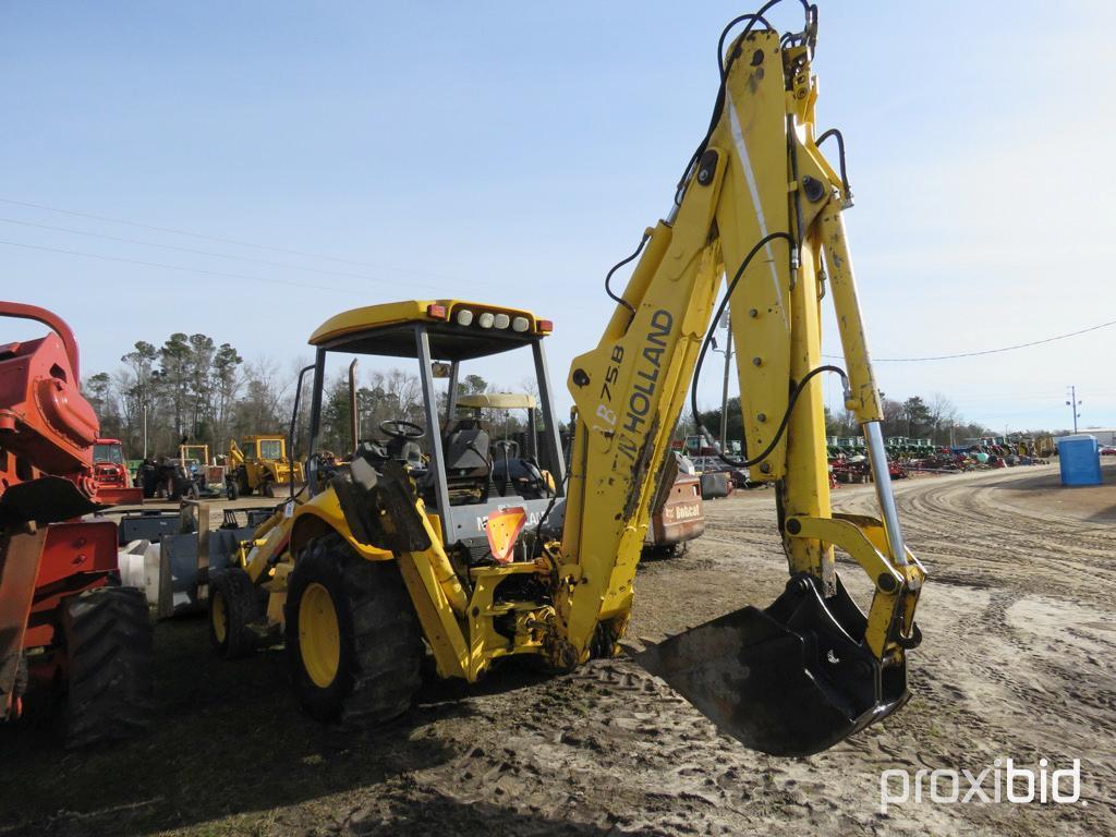NEW HOLLAND LB75 BACKHOE 2WD OPEN-STATION W/ BUCKET & FORKS SN#031032951 (ODOMETER SHOWS: 4,600 HRS.