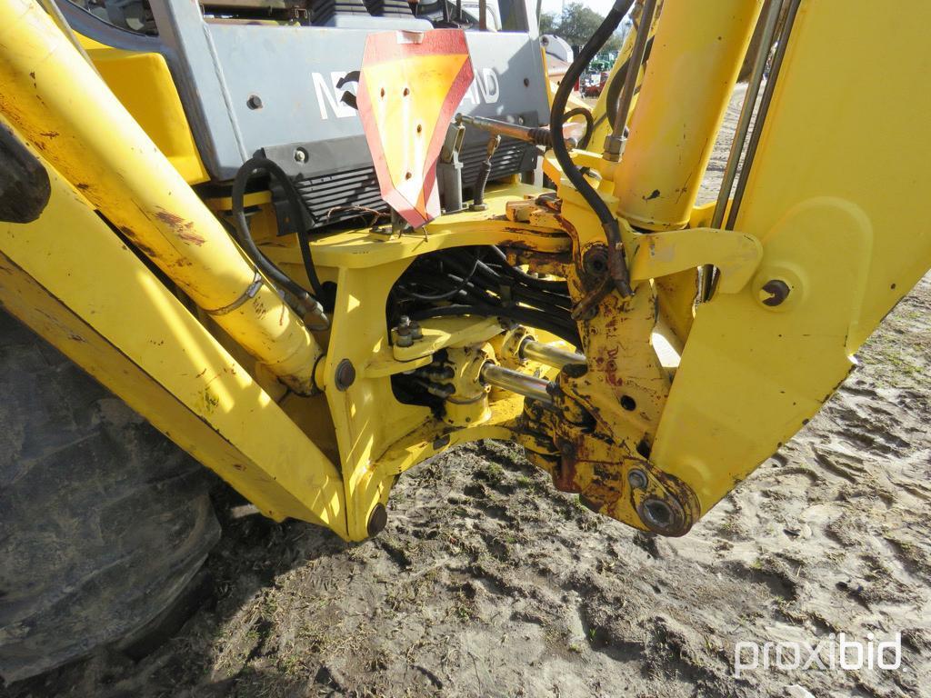 NEW HOLLAND LB75 BACKHOE 2WD OPEN-STATION W/ BUCKET & FORKS SN#031032951 (ODOMETER SHOWS: 4,600 HRS.
