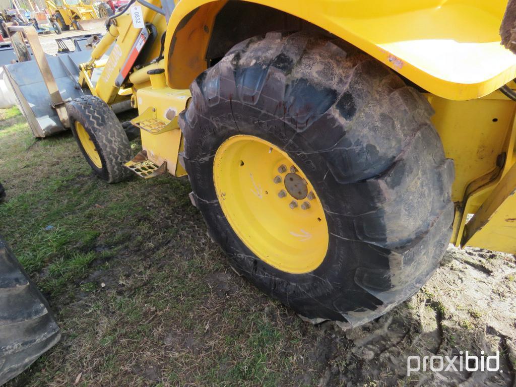 NEW HOLLAND LB75 BACKHOE 2WD OPEN-STATION W/ BUCKET & FORKS SN#031032951 (ODOMETER SHOWS: 4,600 HRS.