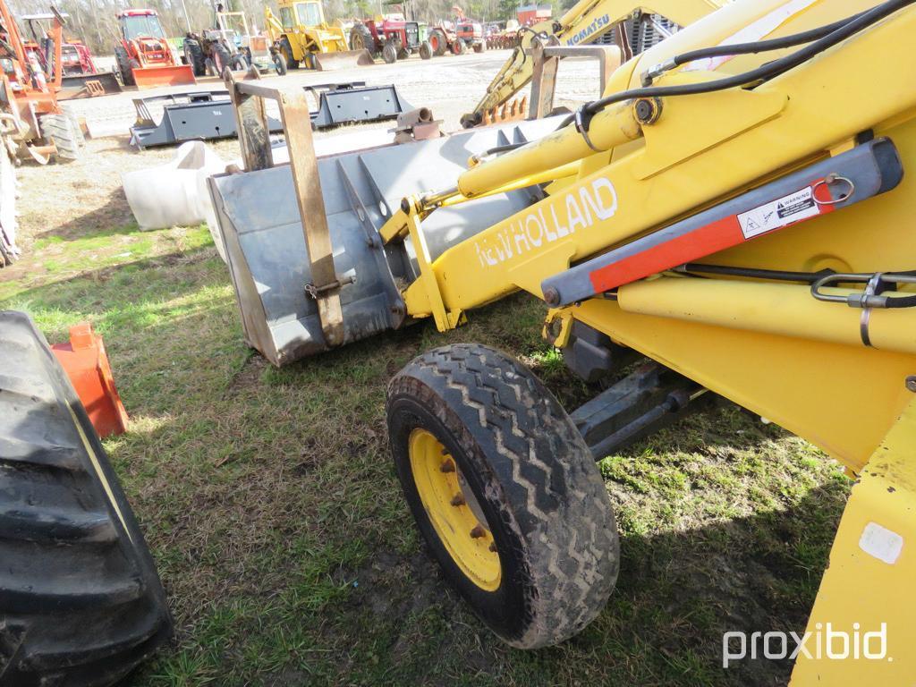 NEW HOLLAND LB75 BACKHOE 2WD OPEN-STATION W/ BUCKET & FORKS SN#031032951 (ODOMETER SHOWS: 4,600 HRS.