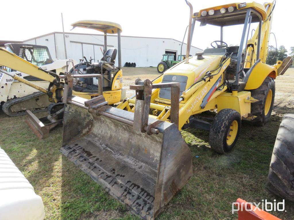 NEW HOLLAND LB75 BACKHOE 2WD OPEN-STATION W/ BUCKET & FORKS SN#031032951 (ODOMETER SHOWS: 4,600 HRS.