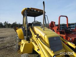 NEW HOLLAND LB75 BACKHOE 2WD OPEN-STATION W/ BUCKET & FORKS SN#031032951 (ODOMETER SHOWS: 4,600 HRS.