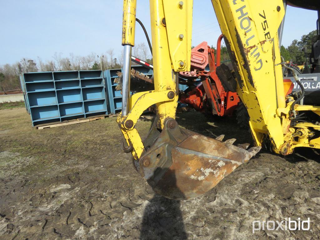 NEW HOLLAND LB75 BACKHOE 2WD OPEN-STATION W/ BUCKET & FORKS SN#031032951 (ODOMETER SHOWS: 4,600 HRS.