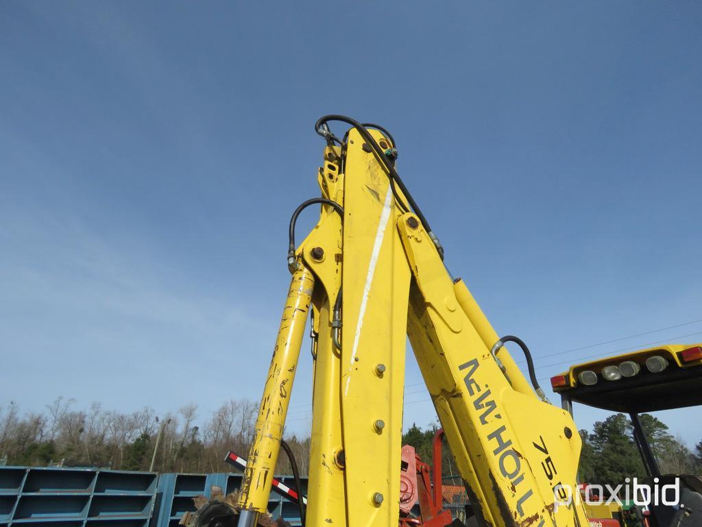 NEW HOLLAND LB75 BACKHOE 2WD OPEN-STATION W/ BUCKET & FORKS SN#031032951 (ODOMETER SHOWS: 4,600 HRS.