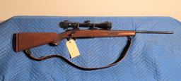 Ruger M77, .30-06 bolt Tasco scope and leather