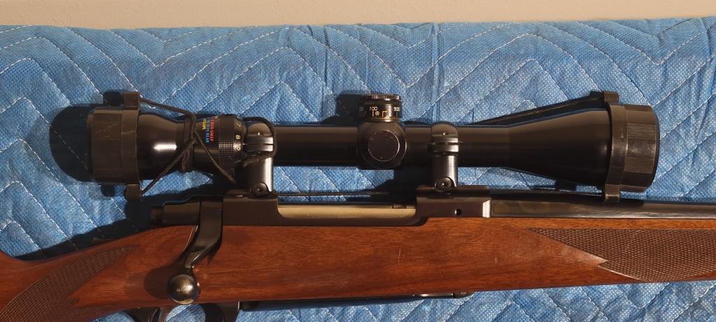 Ruger M77, .30-06 bolt Tasco scope and leather