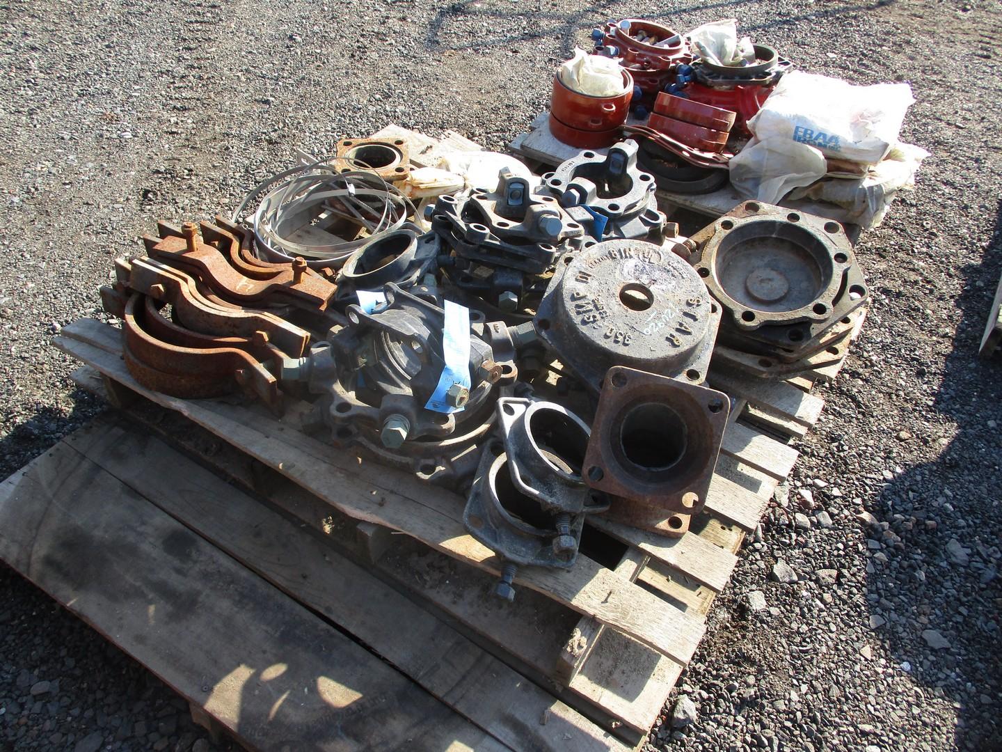 Assortment of Water Pipe Fittings and Clamps