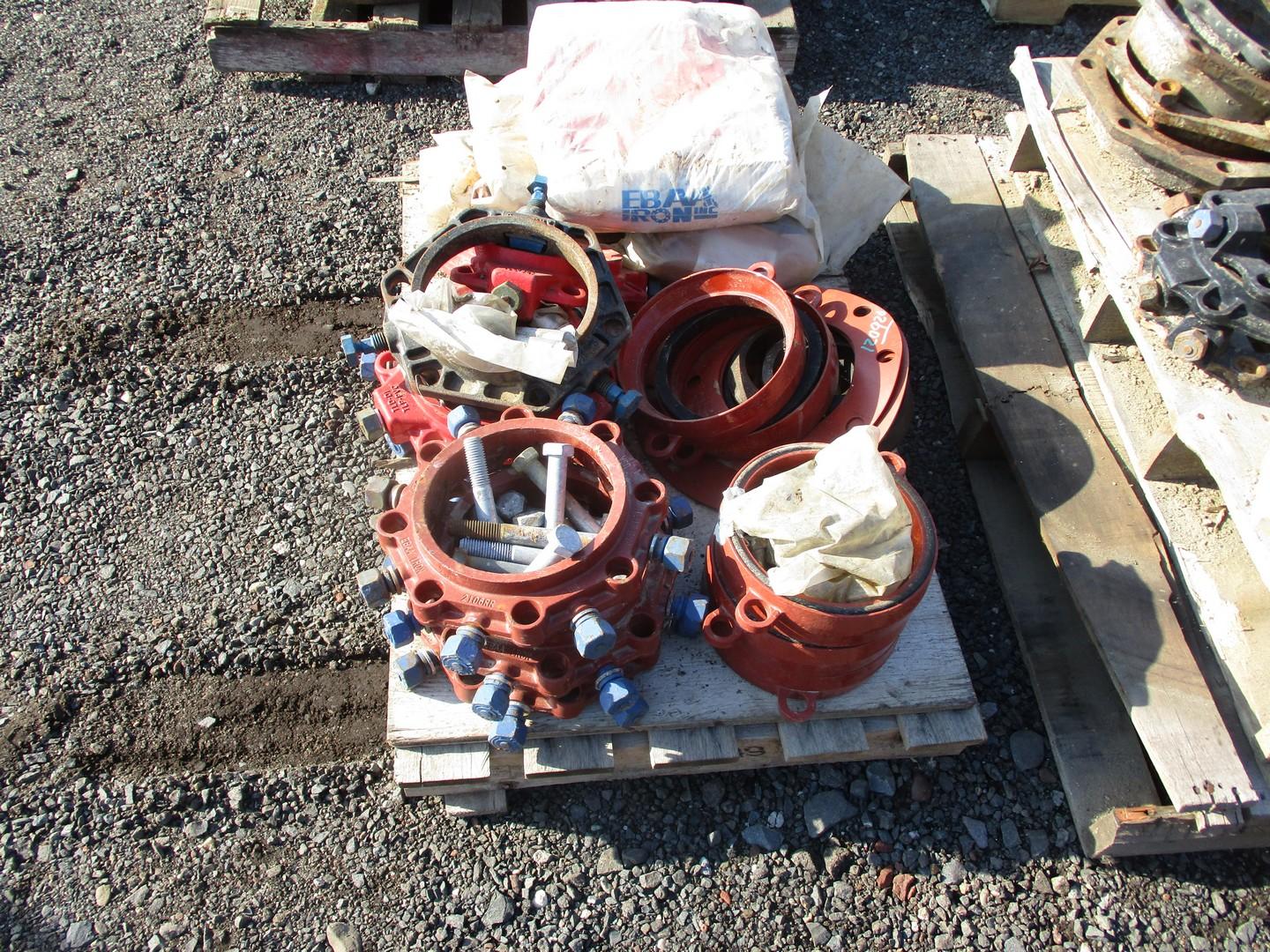 Assortment of Water Pipe Fittings and Clamps