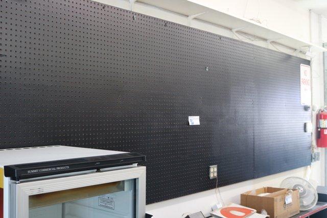 12' Black painted peg board