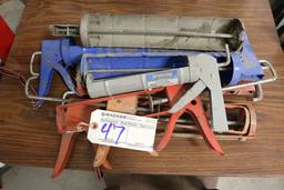 Caulk guns