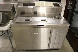 Delfield 44" ice cream dipping cabinet with raised topping rail and dip wel