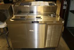 Delfield 44" ice cream dipping cabinet with raised topping rail and dip wel