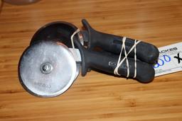 Times 3 - pizza cutters