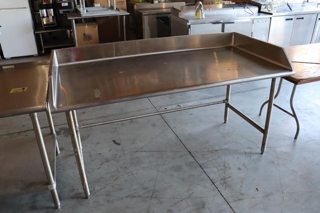36" x 72" stainless table with open base & 6" left, right, & back splash