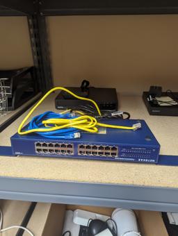 All to go - 2 shelves of network routers & switch