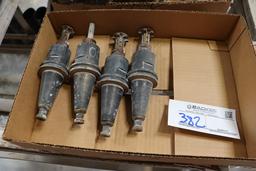 Times 4  - tool holders with used cutters