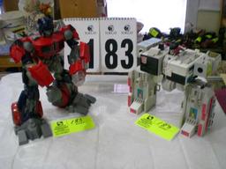Truck Transformer, 2006, 11"t x 10"w; Hasbro Transformer, 1985, 8"t x 9"w