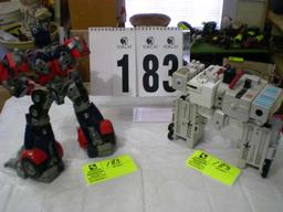 Truck Transformer, 2006, 11"t x 10"w; Hasbro Transformer, 1985, 8"t x 9"w