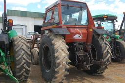 HESTON 80-90 2WD C/A W/ LDR AND HAY FORKS 4416 HRS. WE DO NOT GAURANTEE HOURS