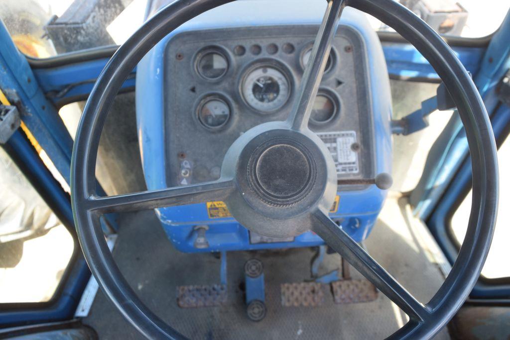 FORD 7700 4WD C/A W/ LDR AND BUCKET 5159HRS. WE DO NOT GAURANTEE HOURS