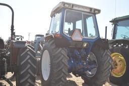 FORD 6610 2WD C/A W/ LDR AND HAY FORK