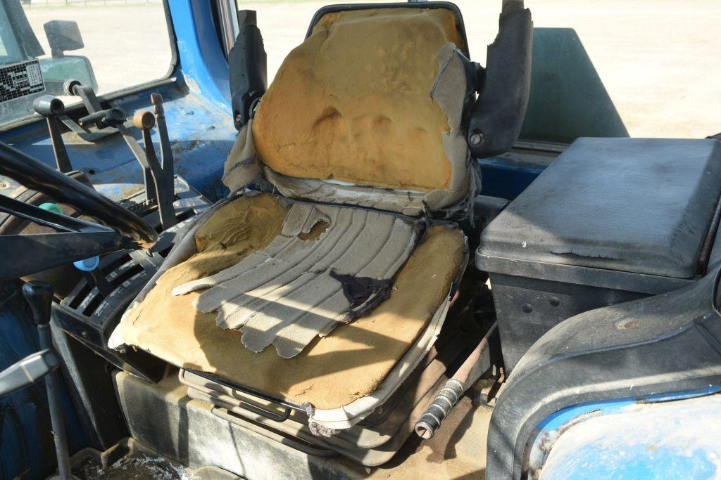 FORD 6610 2WD C/A W/ LDR AND HAY FORK