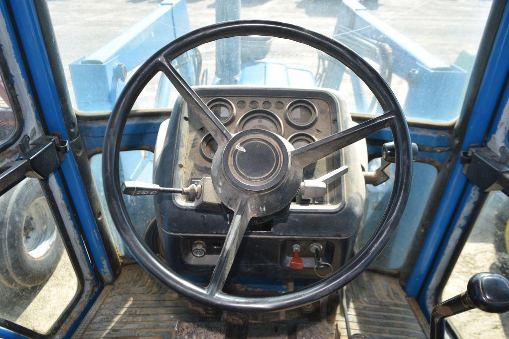 FORD 6610 2WD C/A W/ LDR AND HAY FORK